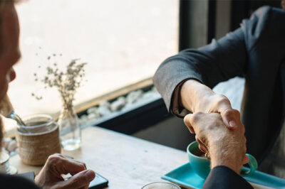 Business agreement shaking hands